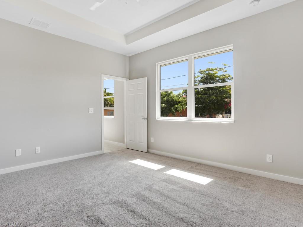 17385 Connecticut Road Fort Myers, FL 33967 - Photo 23 of 31 an empty room with windows