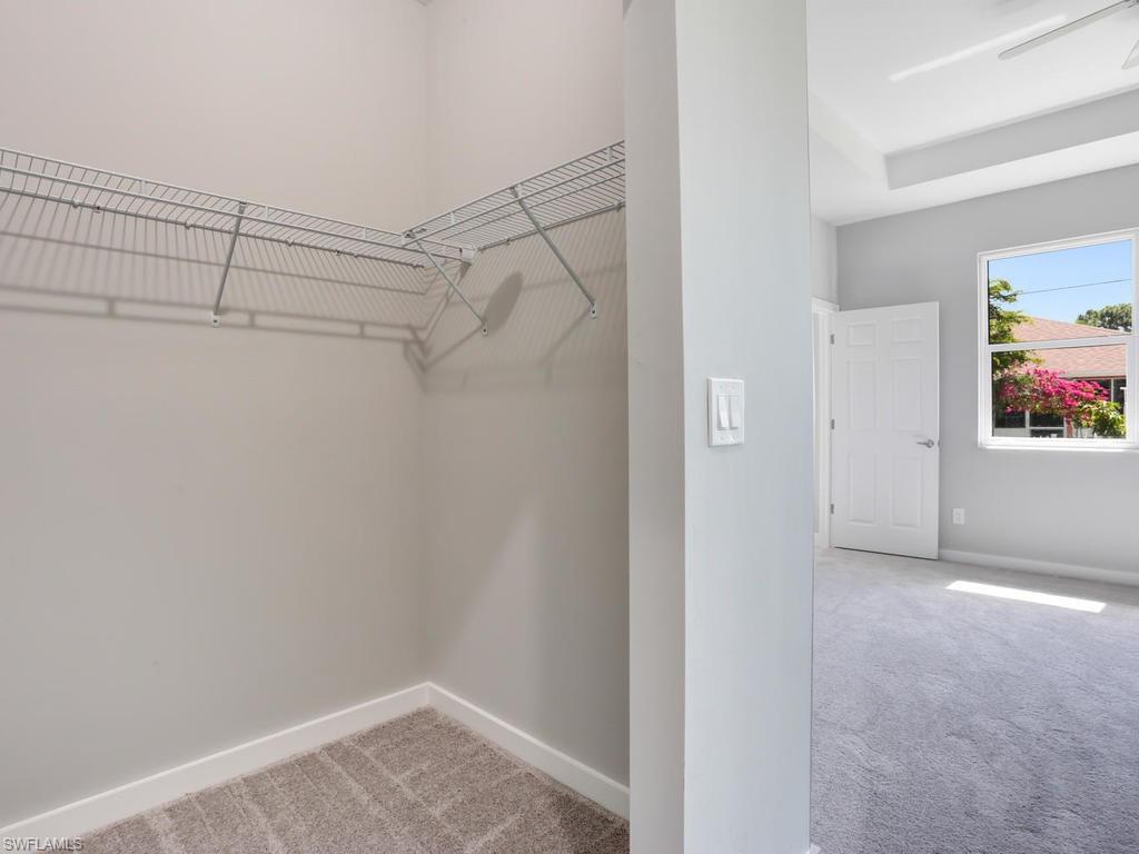 17385 Connecticut Road Fort Myers, FL 33967 - Photo 24 of 31 a view of a room with racks on the wall
