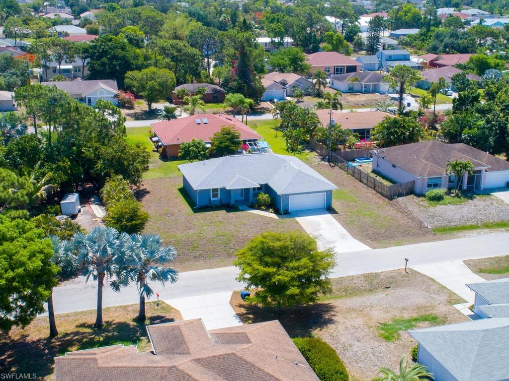 17385 Connecticut Road Fort Myers, FL 33967 - Photo 5 of 31 an aerial view of a houses with yard