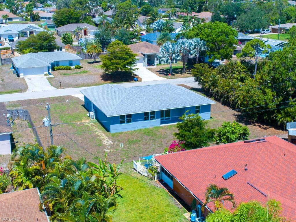 17385 Connecticut Road Fort Myers, FL 33967 - Photo 7 of 31 an aerial view of a house with a yard