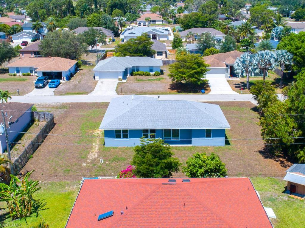 17385 Connecticut Road Fort Myers, FL 33967 - Photo 8 of 31 an aerial view of a house with yard swimming pool and outdoor seating