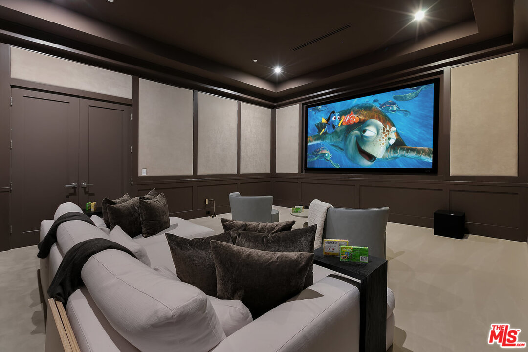 25211 Jim Bridger Road Hidden Hills, CA 91302 - Photo 21 of 42 a couple of chairs sitting in a living room