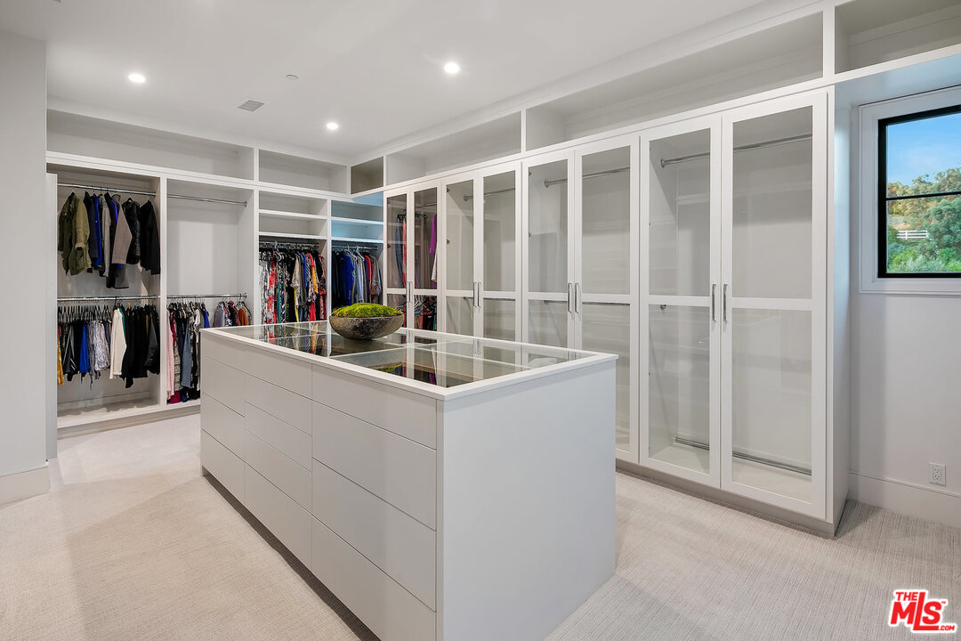 25211 Jim Bridger Road Hidden Hills, CA 91302 - Photo 29 of 42 a view of living room with furniture and window