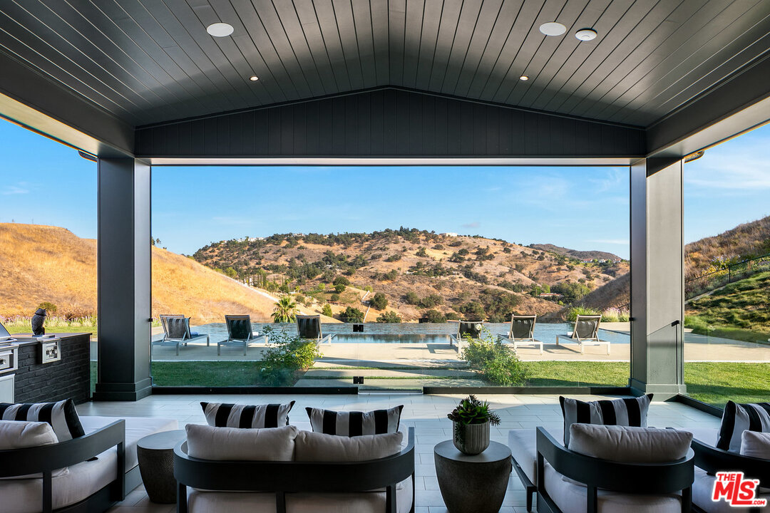 25211 Jim Bridger Road Hidden Hills, CA 91302 - Photo 39 of 42 a outdoor view with a sitting space