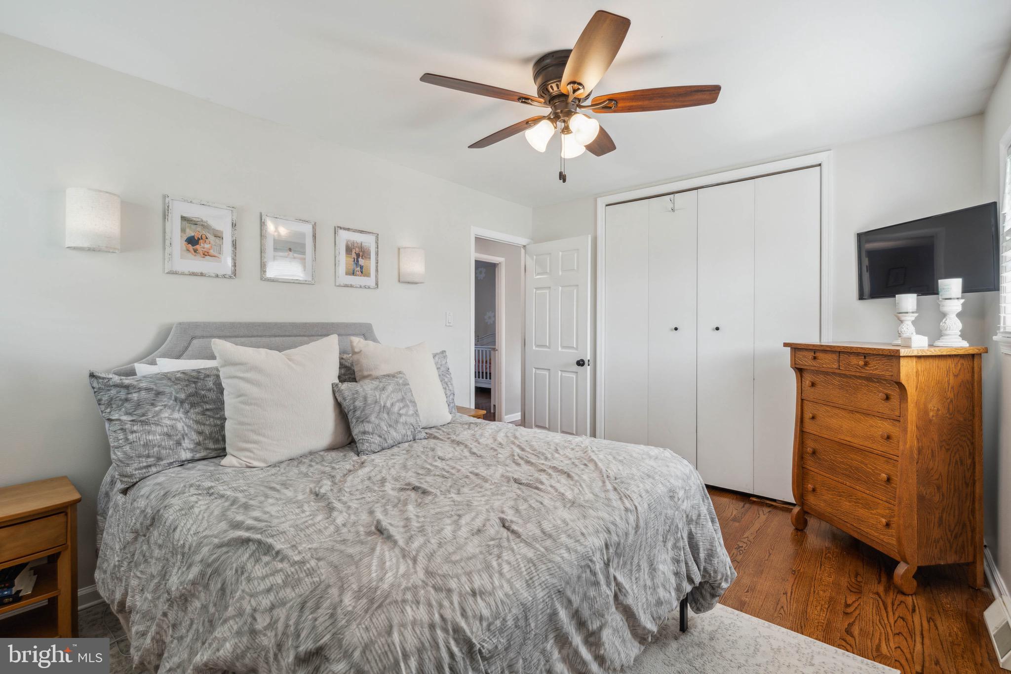 406 Bryanstone Road Owings Mills, MD 21117 - Photo 14 of 36 Primary Bedroom w/ Hardwood Floors