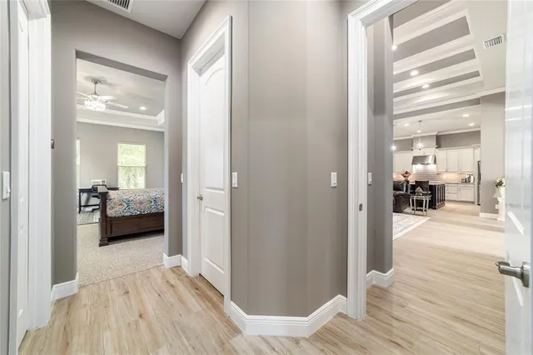 a large bathroom with a granite countertop double vanity sink and a mirror
