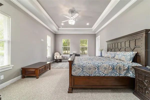 a bathroom with a granite countertop shower and a sink