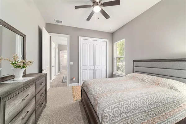 a view of a house with backyard and porch