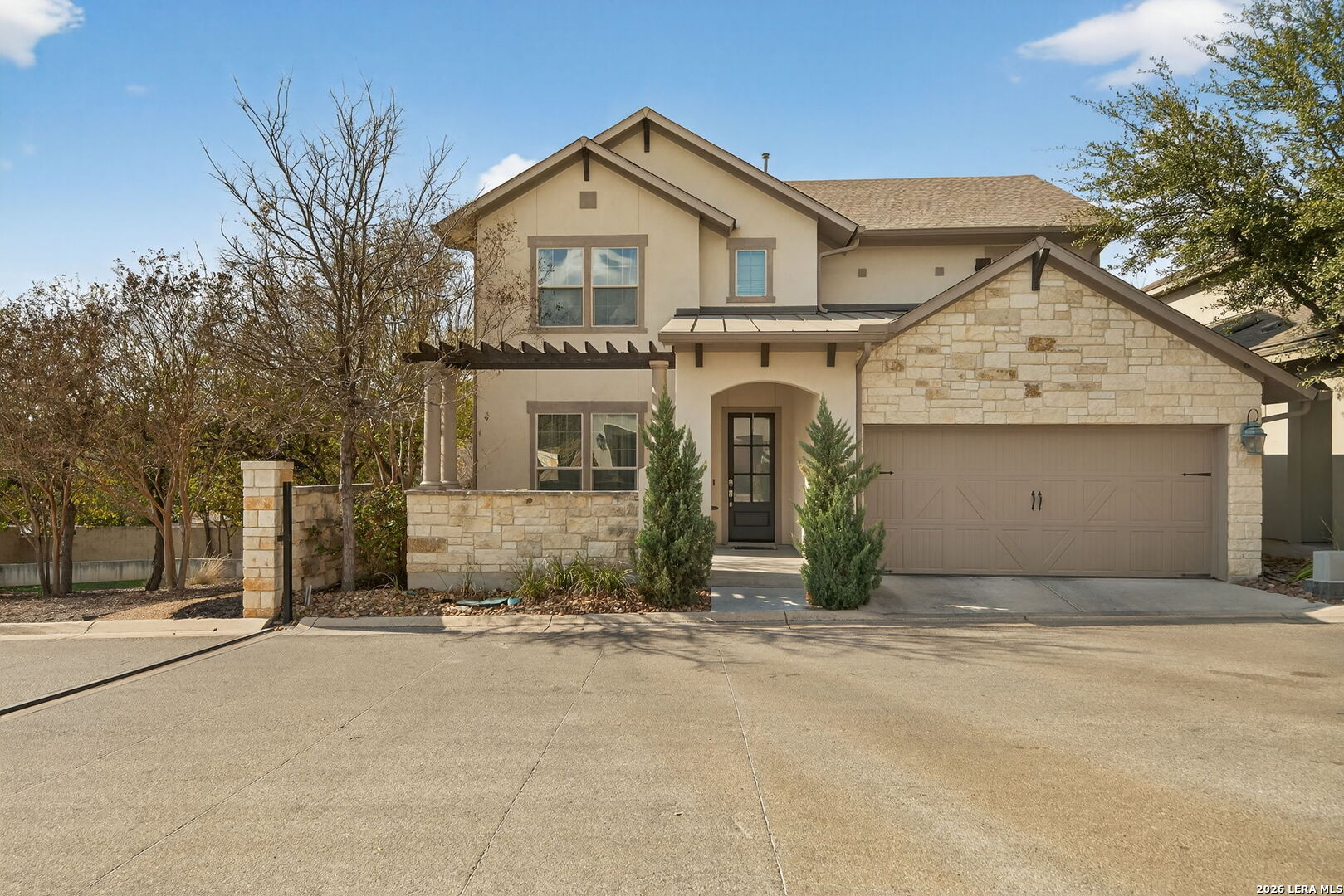 front view of a house with a yard