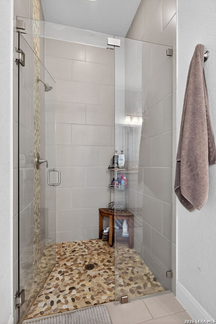 11202 Vance Jackson Road, Unit 17 San Antonio, TX 78230 - Photo 12 of 19 a bathroom with a shower