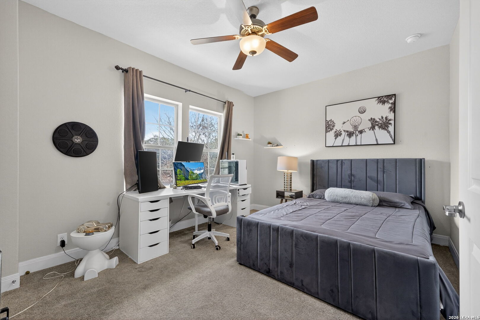 11202 Vance Jackson Road, Unit 17 San Antonio, TX 78230 - Photo 13 of 19 a bedroom with a bed and a window