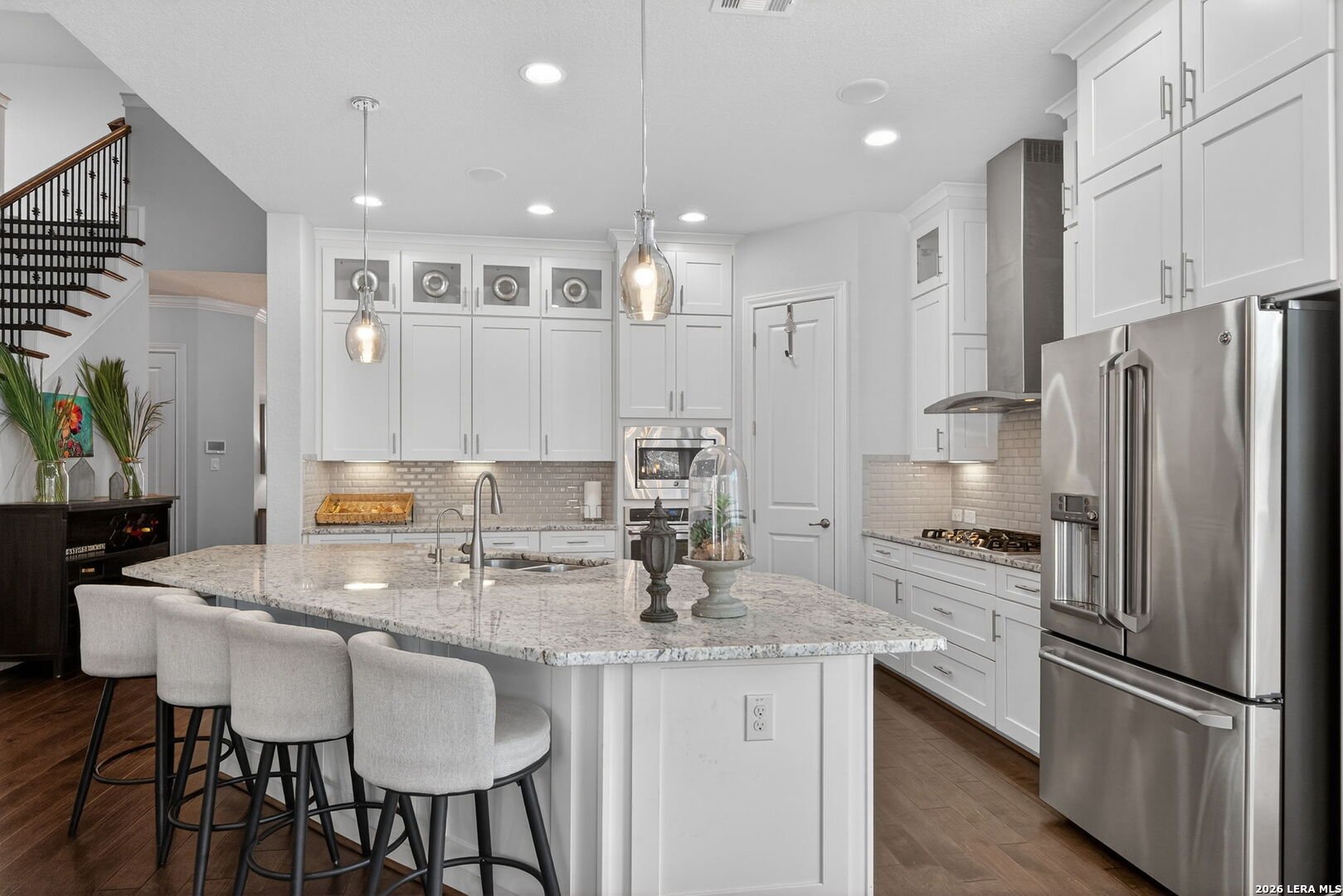 11202 Vance Jackson Road, Unit 17 San Antonio, TX 78230 - Photo 7 of 19 a kitchen with stainless steel appliances granite countertop a sink refrigerator and cabinets