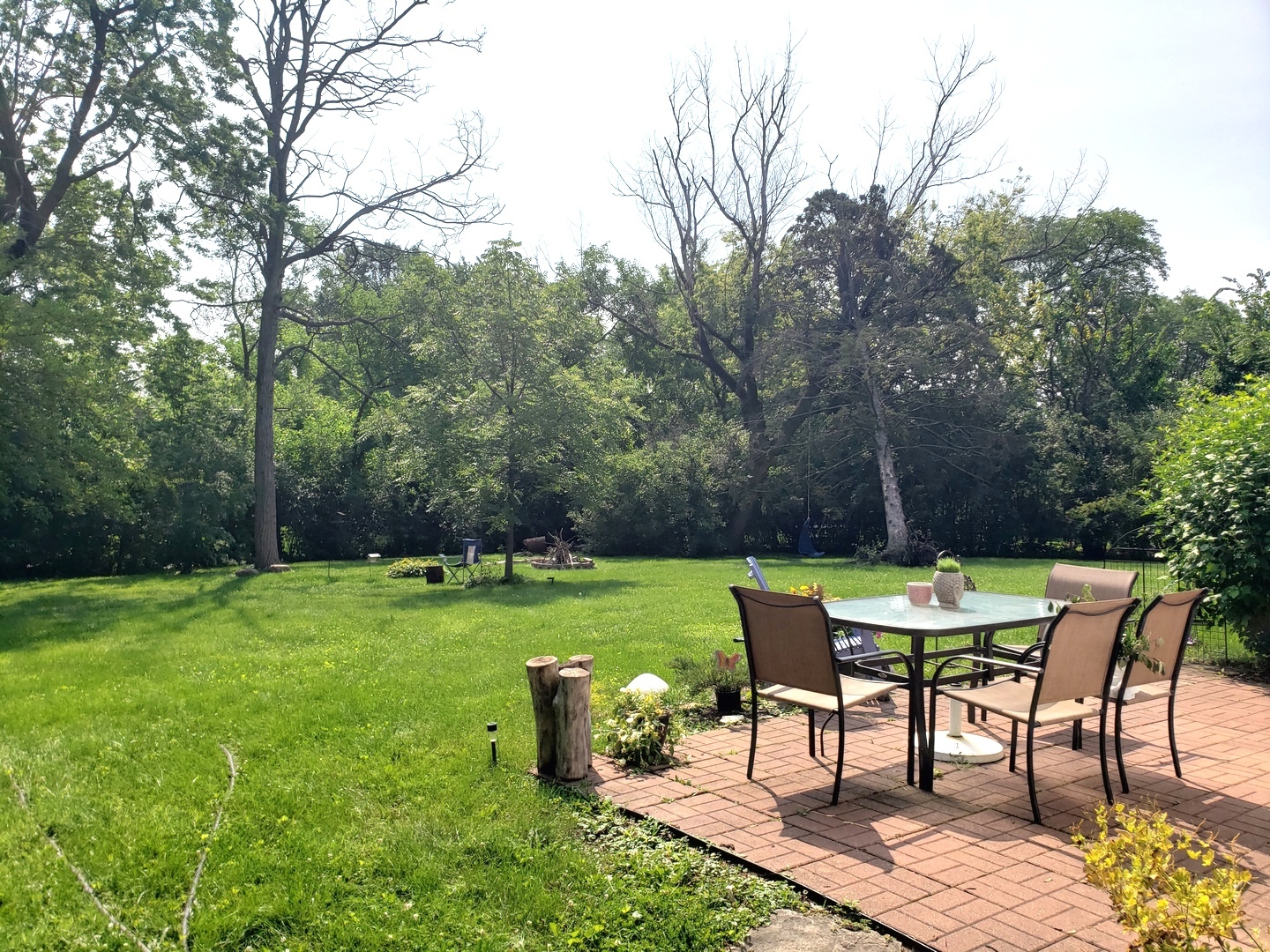 515 Warren Road Glenview, IL 60025 - Photo 11 of 11 a view of a table and chairs in the garden