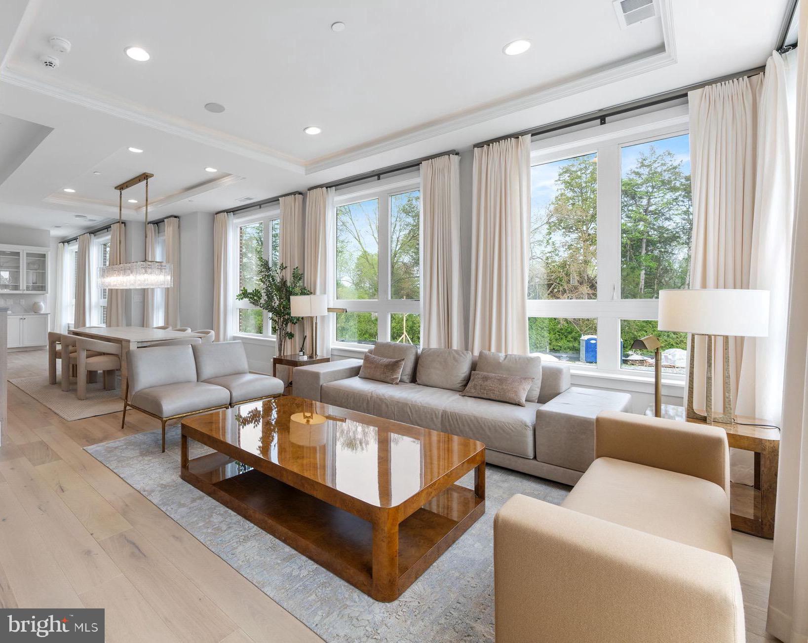 1622 Chain Bridge Road McLean, VA 22101 - Photo 14 of 72 a living room with furniture and a large window