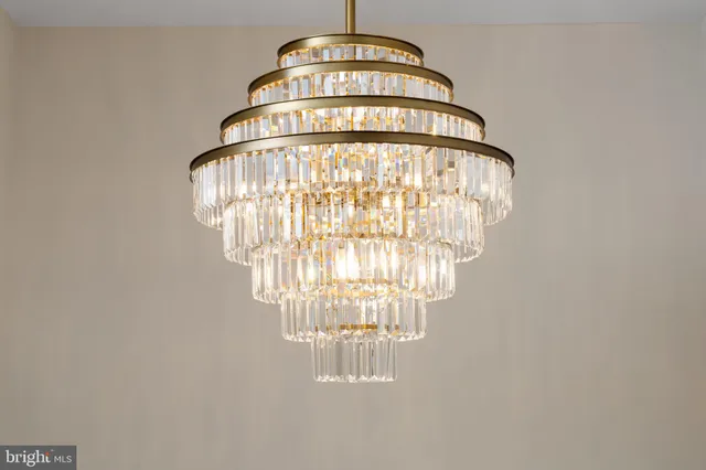 a bathroom with a glass shower door and a glass door