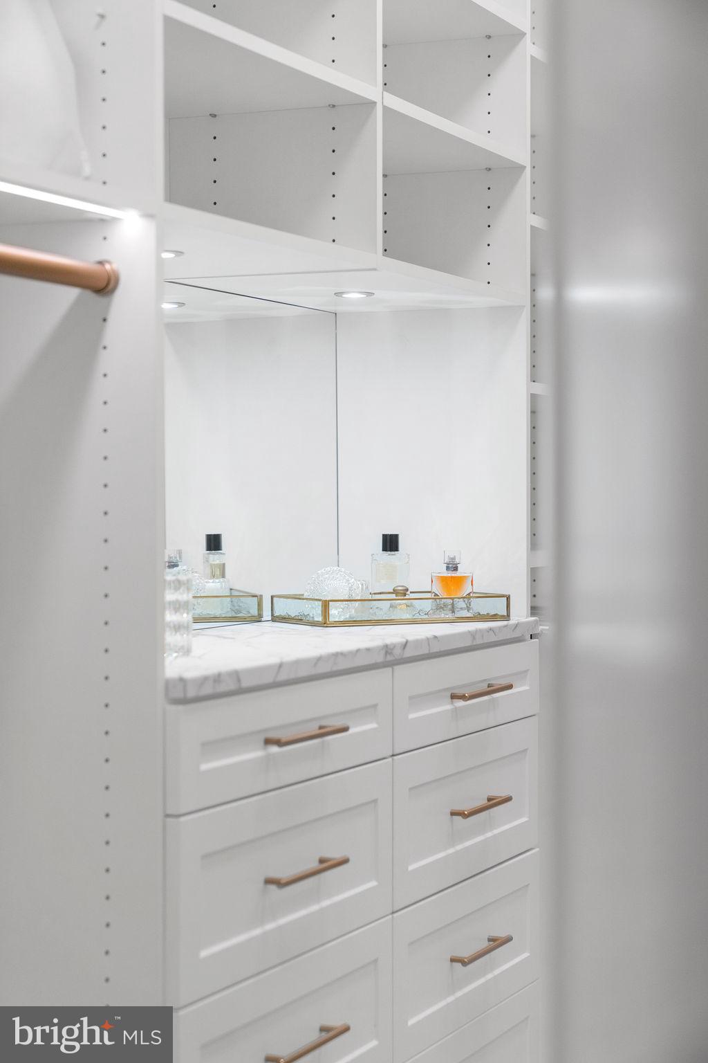 1622 Chain Bridge Road McLean, VA 22101 - Photo 25 of 72 a bathroom with a sink and a mirror