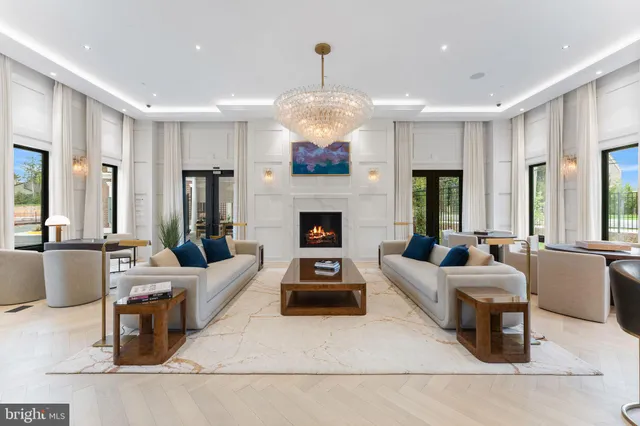 a view of a living room and a balcony