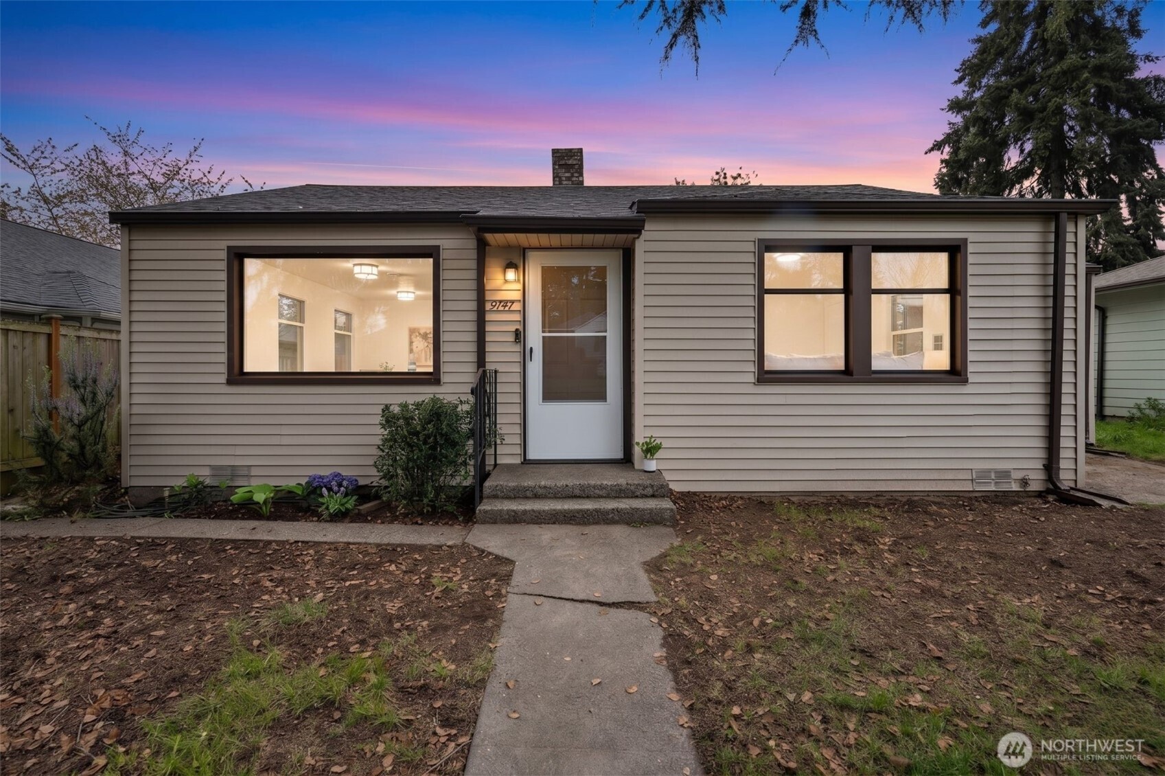 9747 Evanston Avenue North Seattle, WA 98103 - Photo 5 of 34 a front view of a house