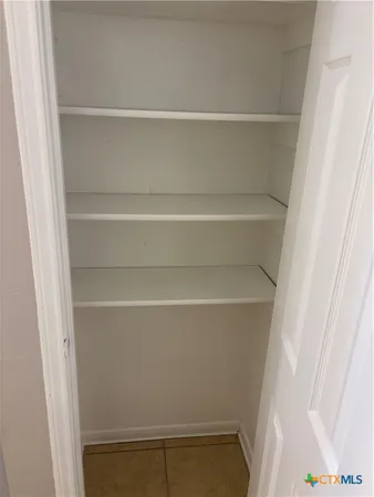 a bathroom with a toilet a sink and bathtub