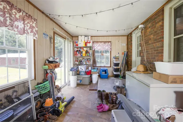 a very nice looking room with a large window and stuff