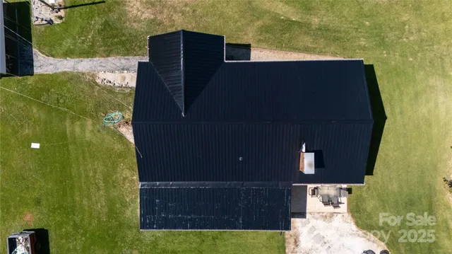 a view of a yard from a balcony