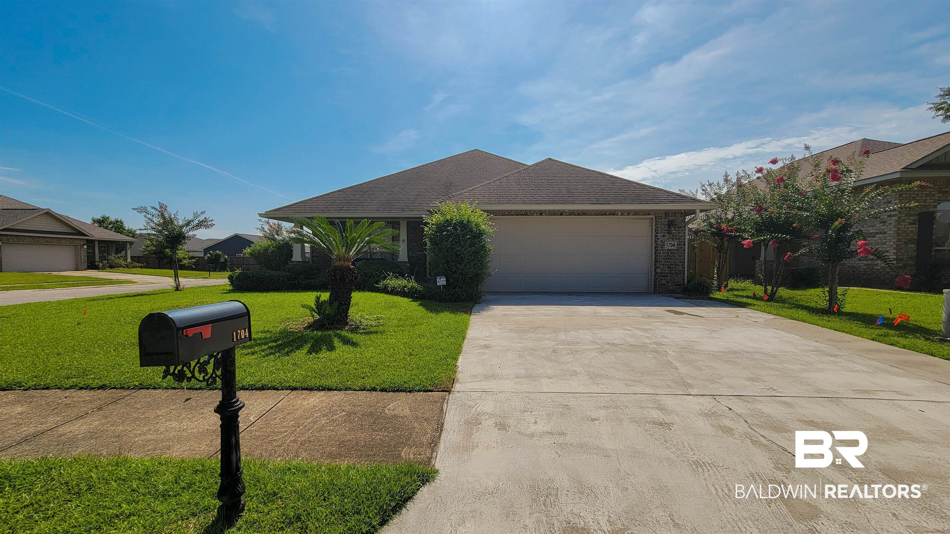 1704 Arcadia Drive Foley, AL 36535 - Photo 49 of 52 Single story home featuring driveway, a front yard, and a garage