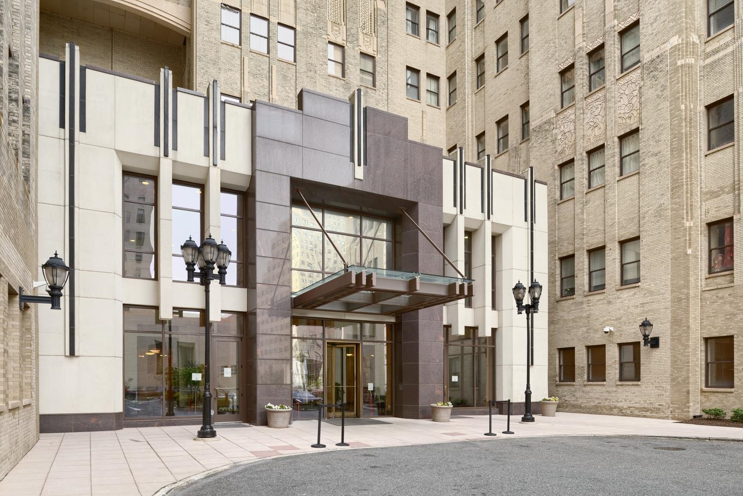 4 Beacon Way, Unit 1511 Jersey City, NJ 07304 - Photo 5 of 17 a view of a building with a street