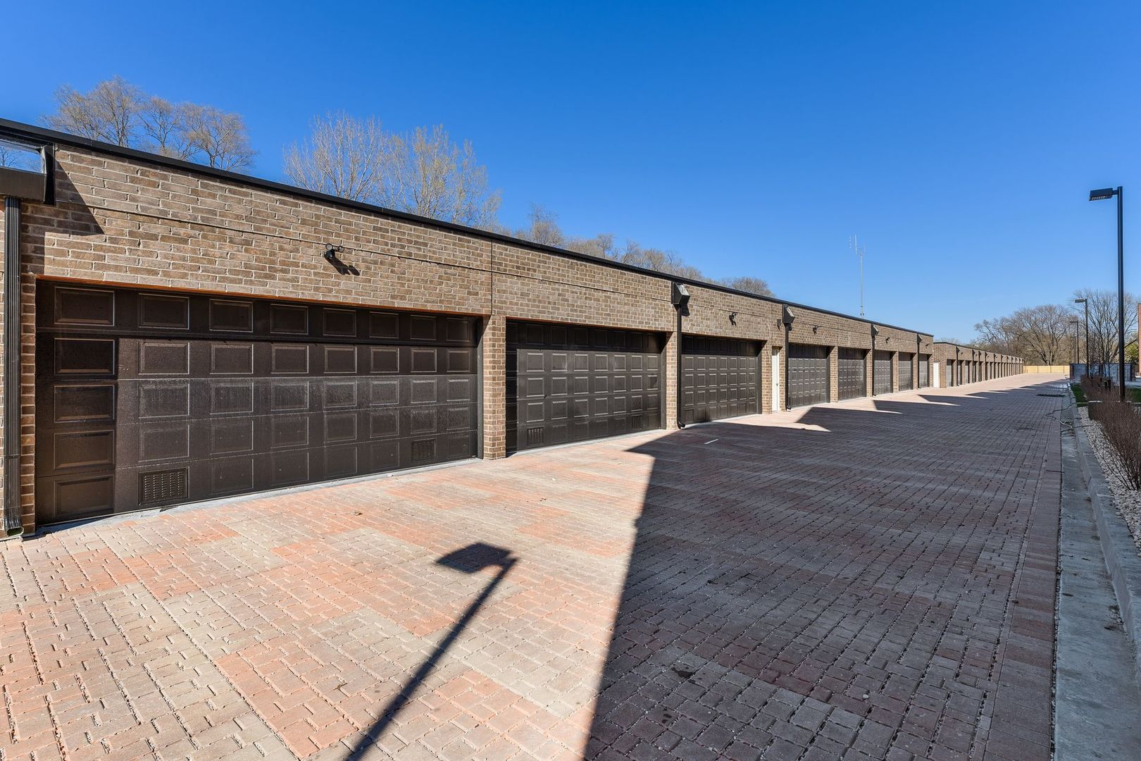 820 East Irving Park Road, Unit 1E Roselle, IL 60172 - Photo 14 of 15 a house view with a backyard space