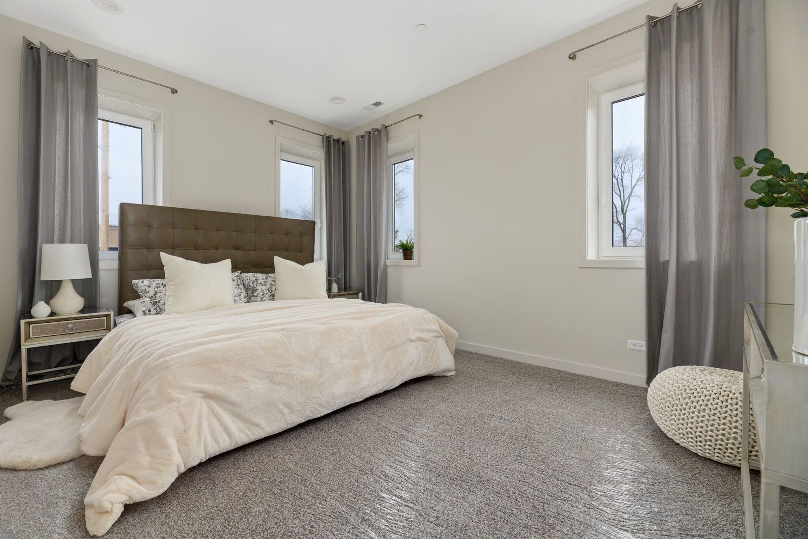 820 East Irving Park Road, Unit 1E Roselle, IL 60172 - Photo 8 of 15 a bedroom with a bed and window