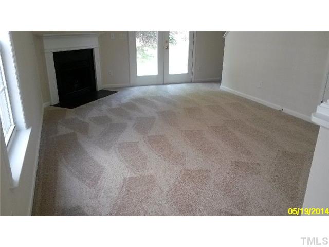2028 Metacomet Way Raleigh, NC 27604 - Photo 3 of 12 a black and white photo of a living room