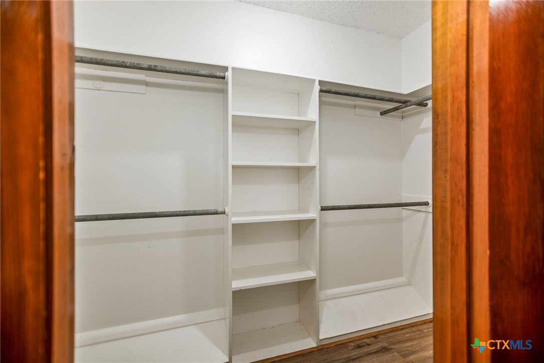 181 Pecan Street Port Lavaca, TX 77979 - Photo 21 of 34 a view of walk in closet with empty racks