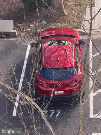 a view of a backyard with sitting area