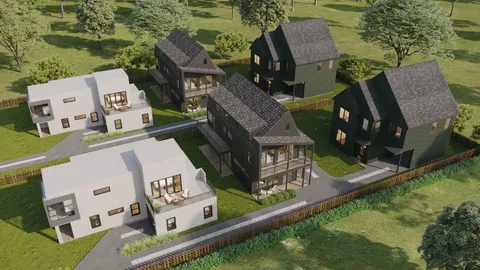 an aerial view of residential houses with outdoor space