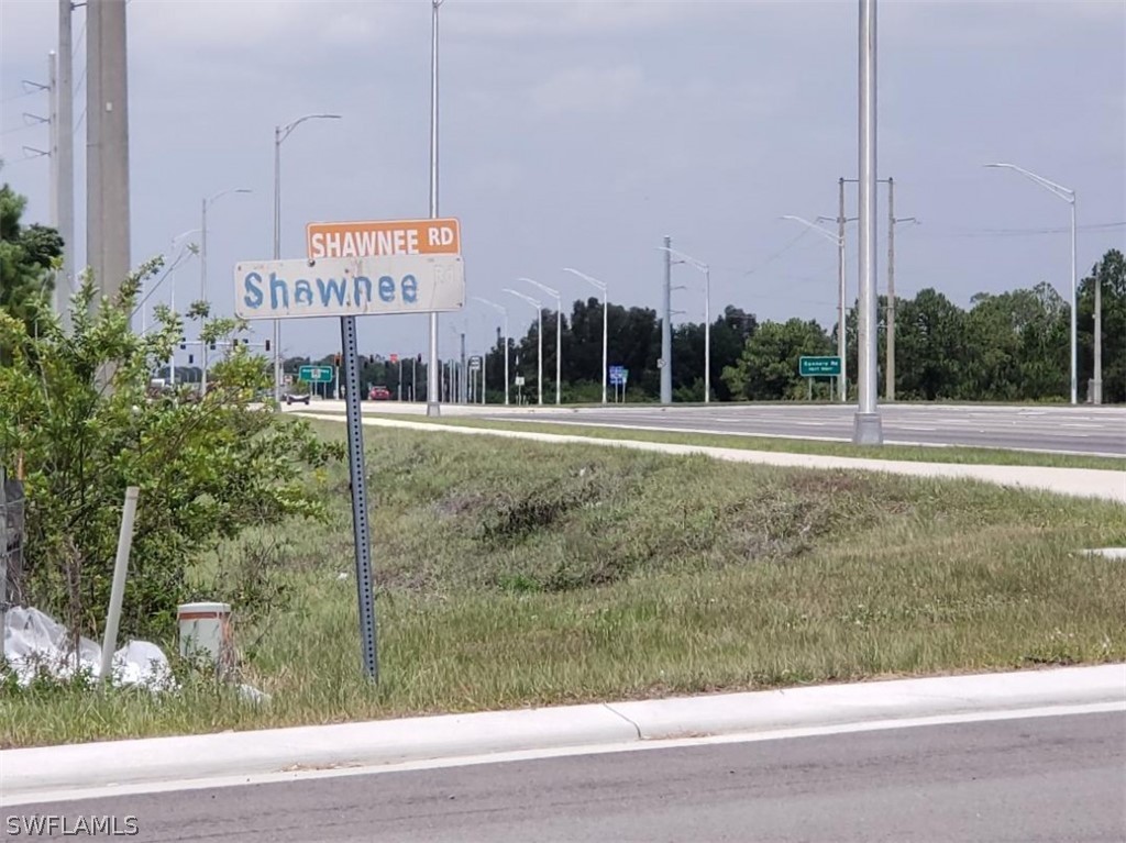 12181 Shawnee Road Fort Myers, FL 33913 - Photo 3 of 6 a sign on the side of a road