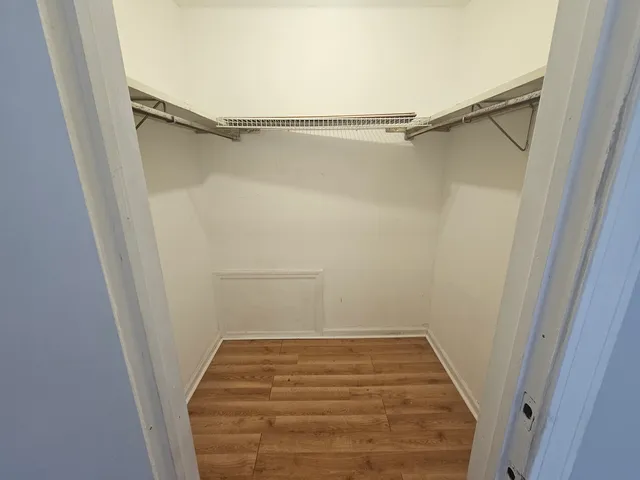 a view of a room with racks on the wall