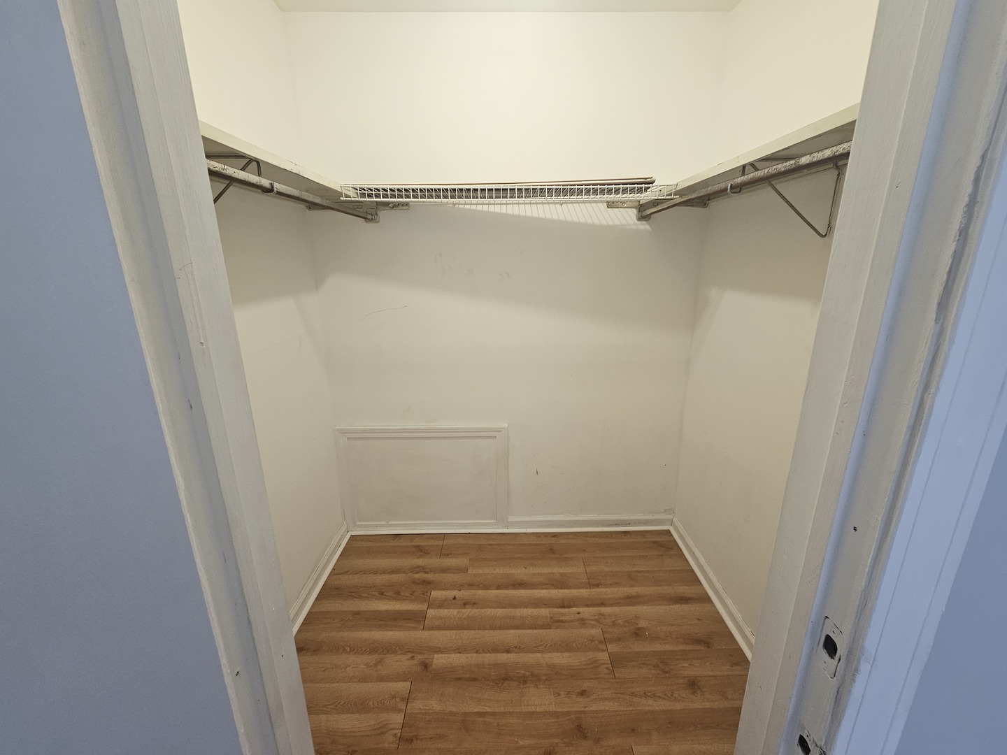 5349 North Delphia Avenue, Unit 150 Chicago, IL 60656 - Photo 9 of 16 a view of a room with racks on the wall