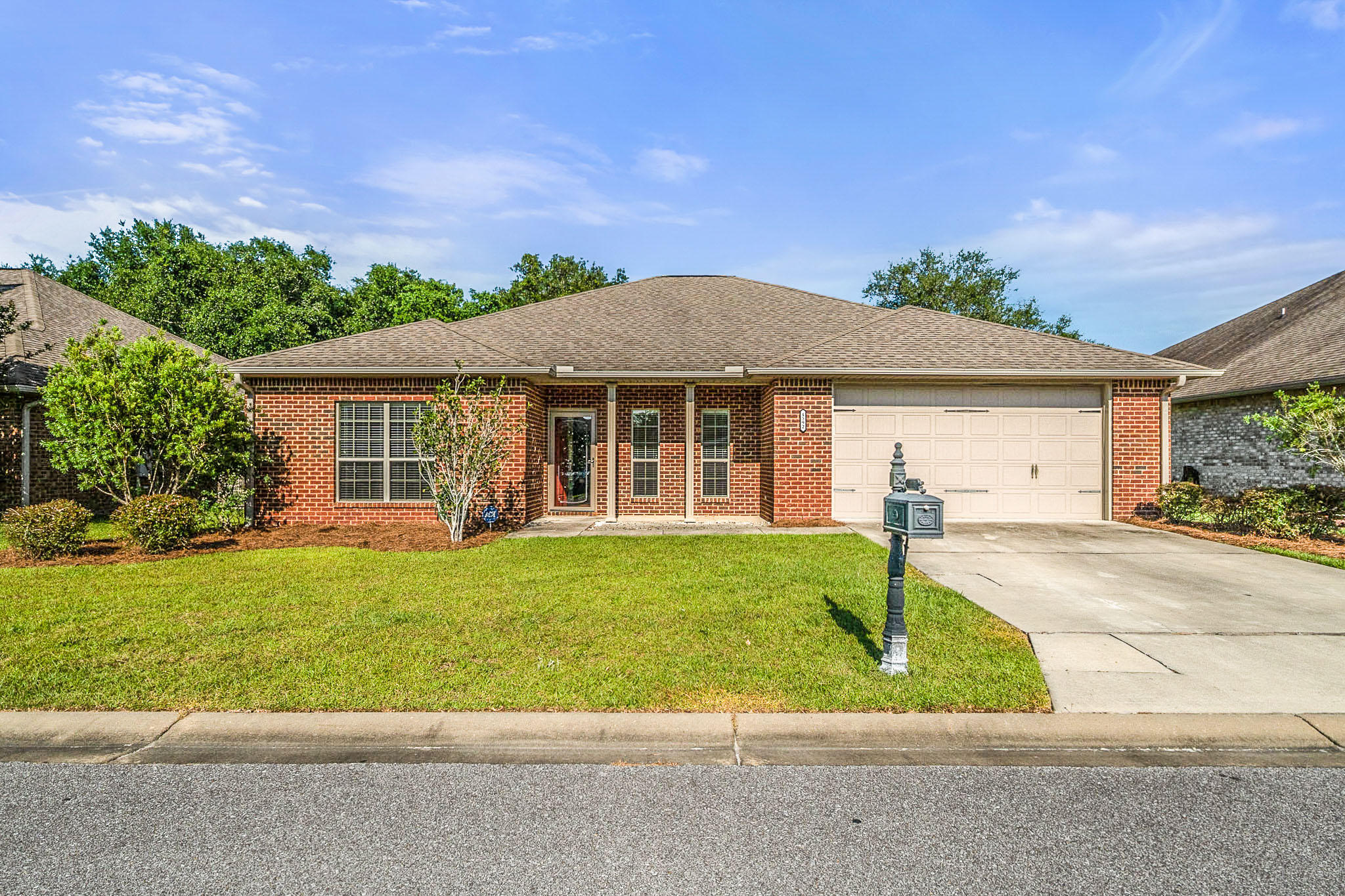 4592 Hermosa Road Crestview, FL 32539 - Photo 1 of 32 front view of a house with a yard