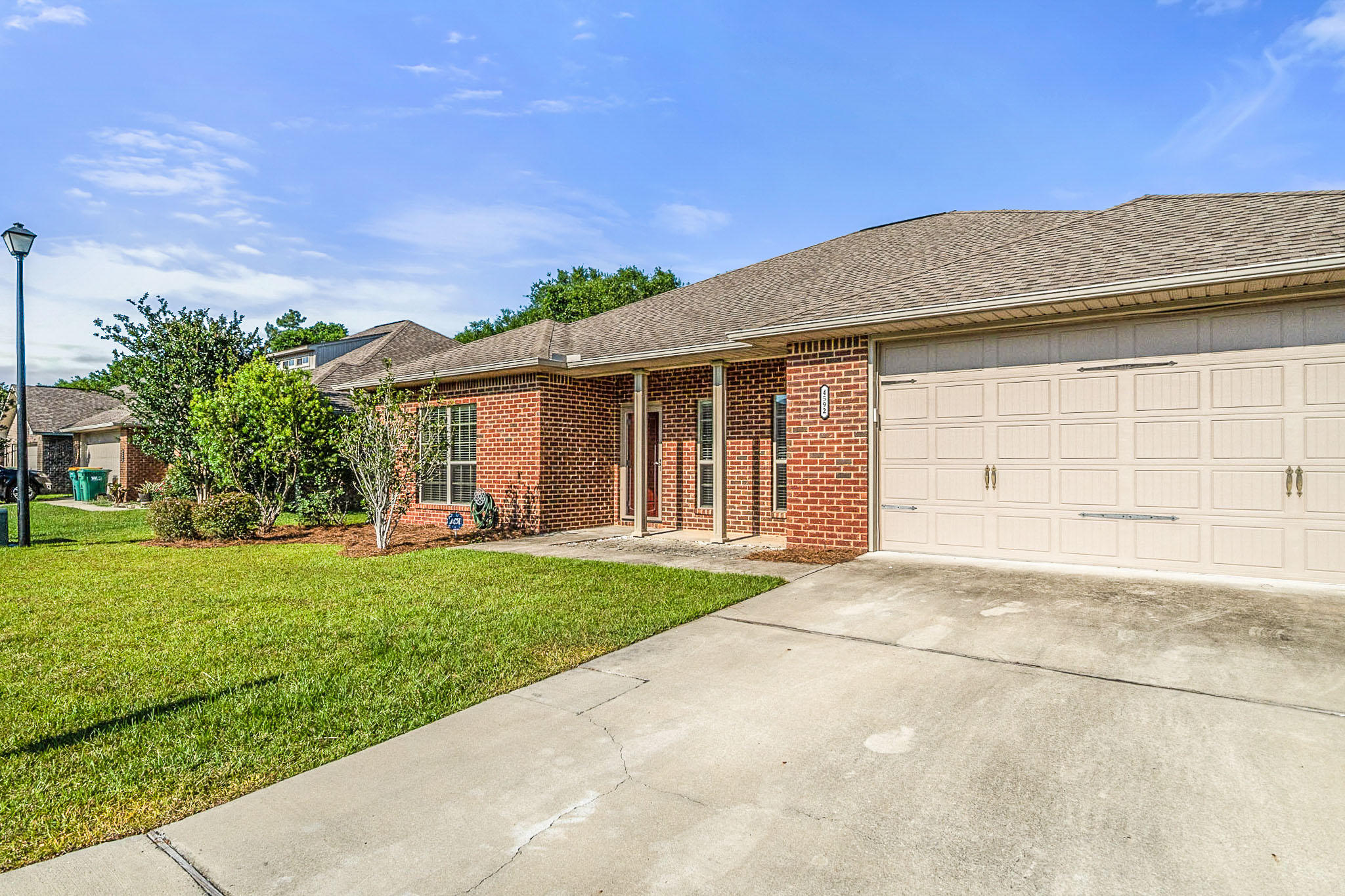 4592 Hermosa Road Crestview, FL 32539 - Photo 3 of 32 a view of a house with garden