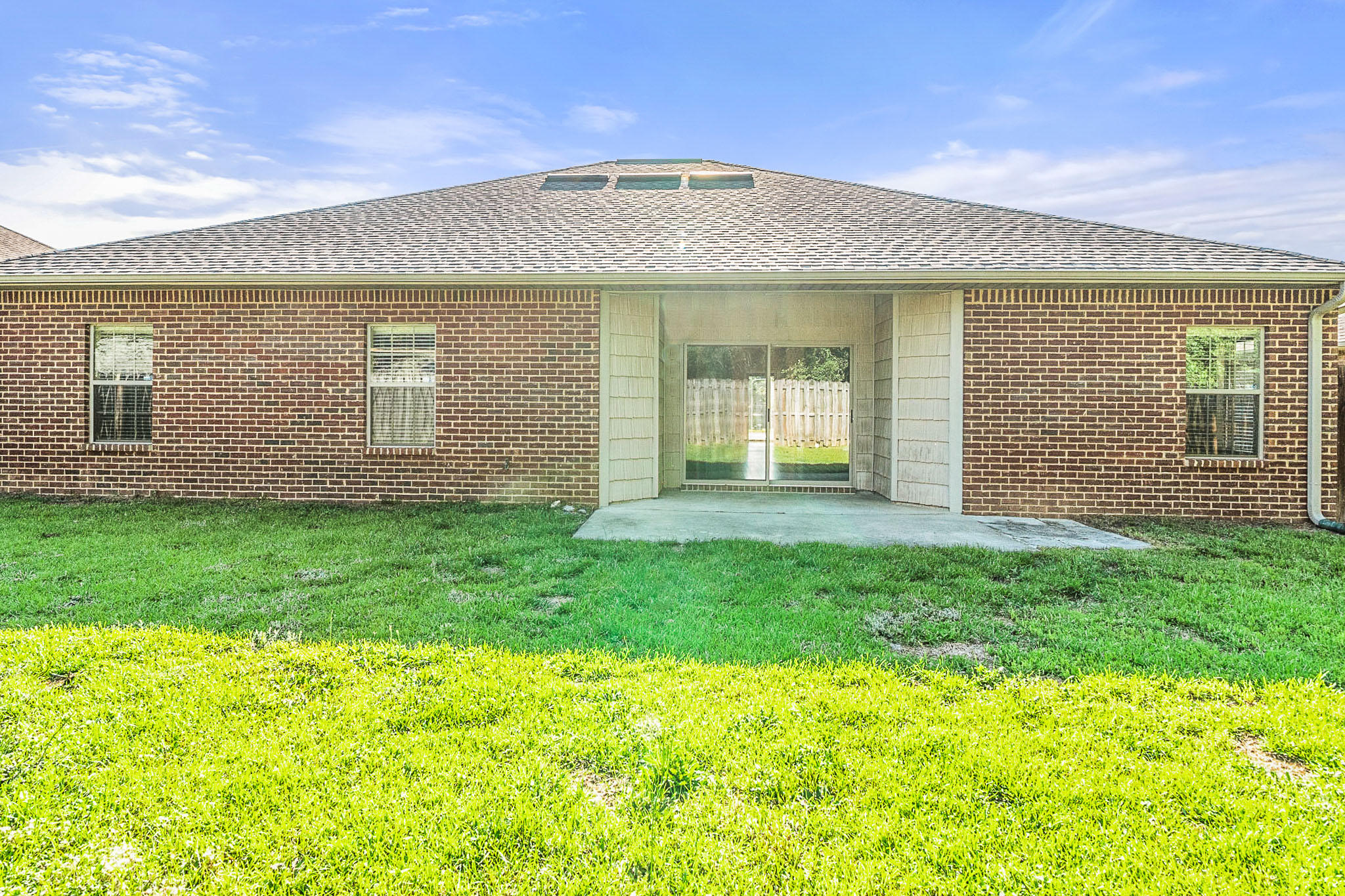 4592 Hermosa Road Crestview, FL 32539 - Photo 31 of 32 a front view of a house with garden