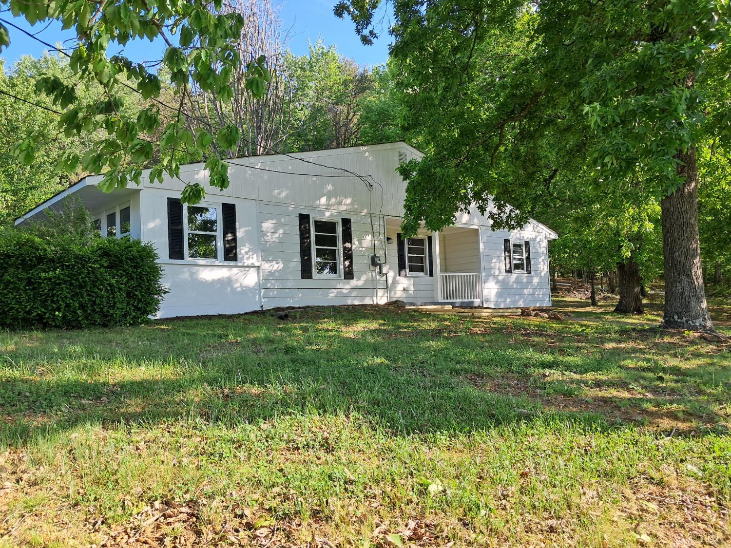 6019 Wards Road Evington, VA 24550 - Photo 19 of 32 a front view of house with yard and green space