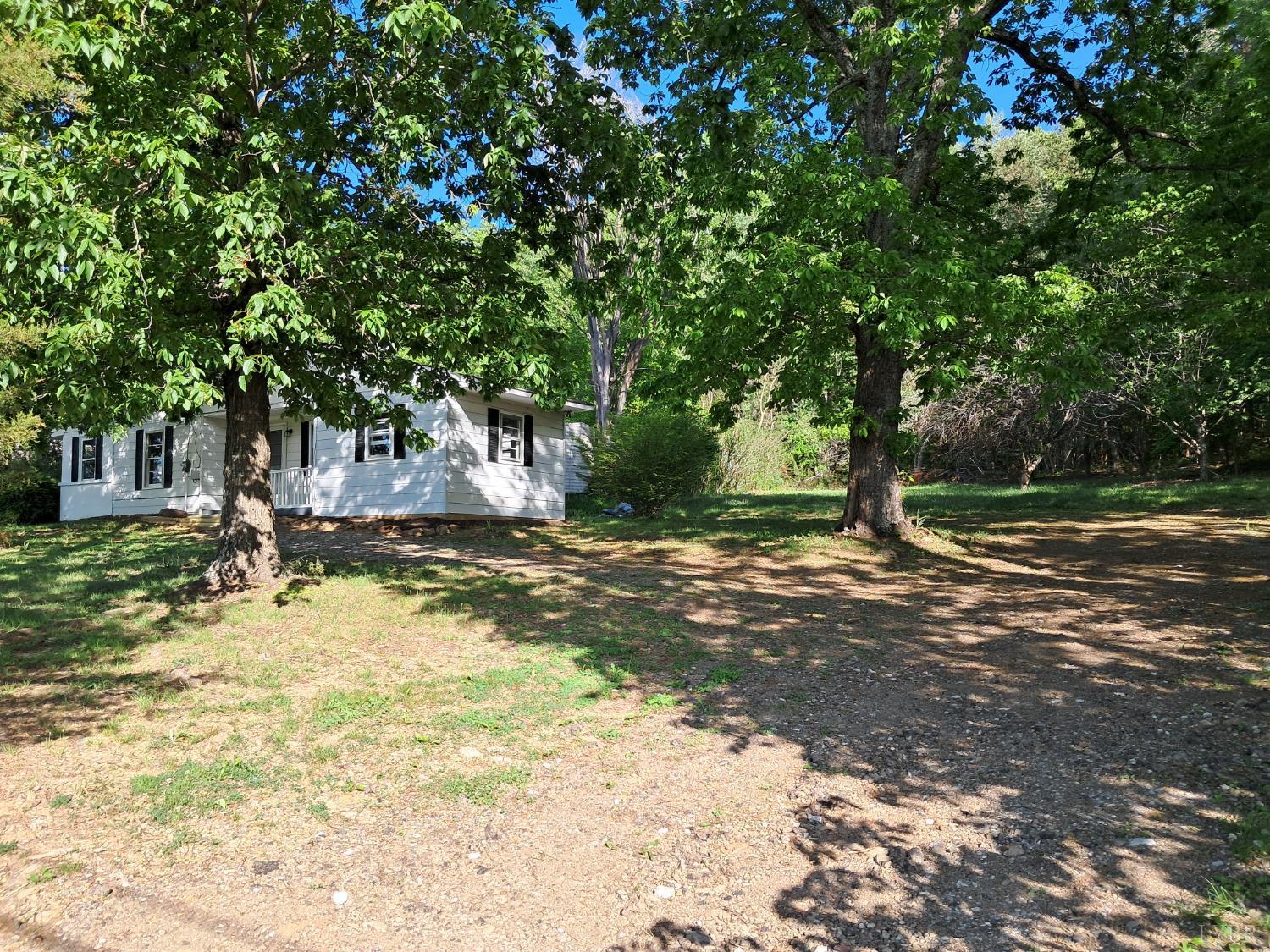 6019 Wards Road Evington, VA 24550 - Photo 26 of 32 a view of a yard with a tree
