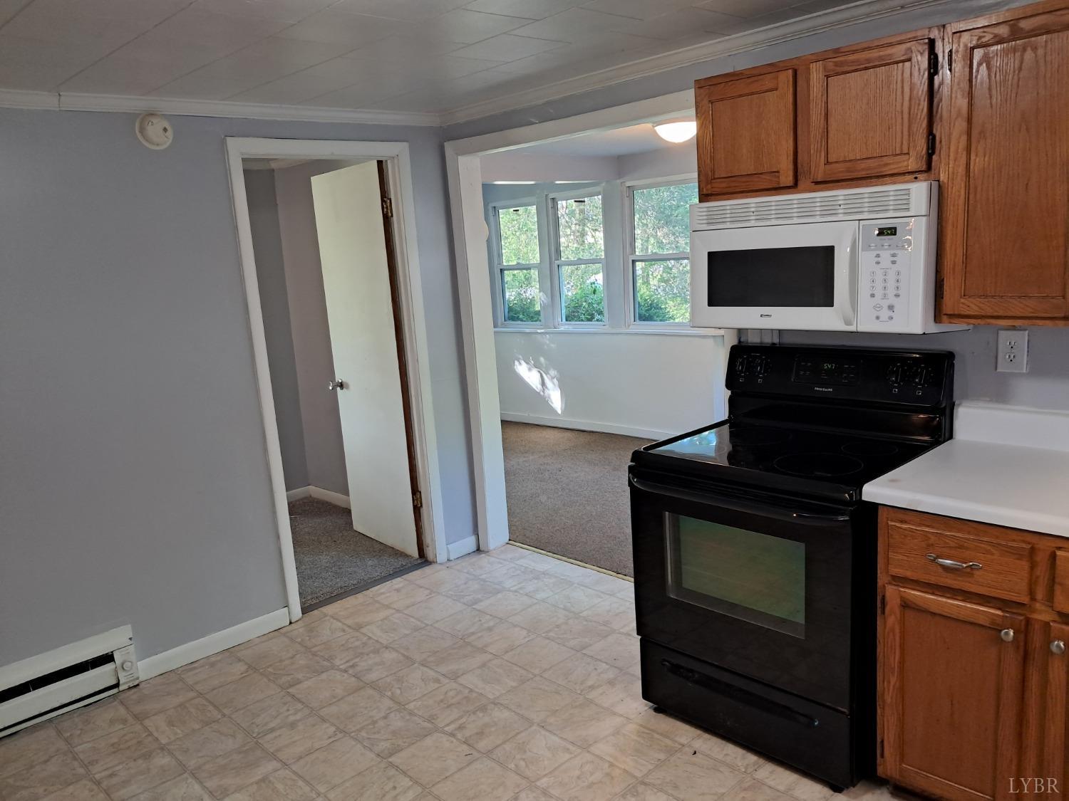 6019 Wards Road Evington, VA 24550 - Photo 5 of 32 a view of kitchen and front door