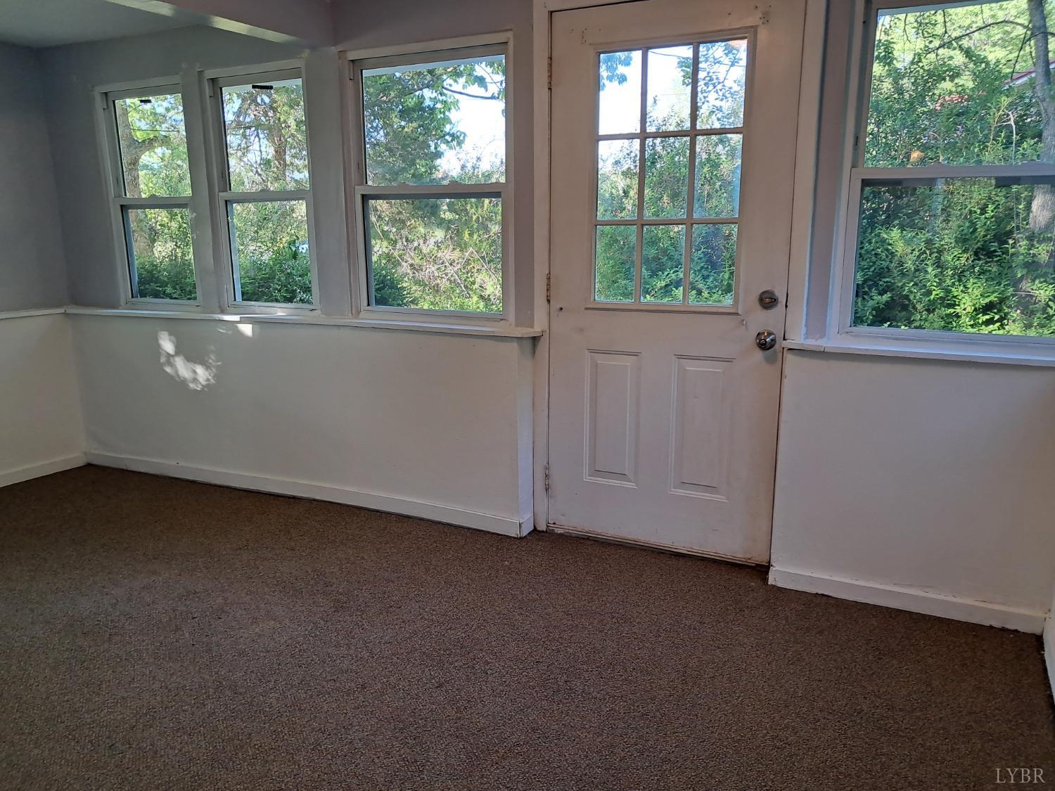 6019 Wards Road Evington, VA 24550 - Photo 8 of 32 an empty room with a window