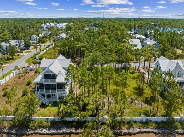 a view of a lake with a yard