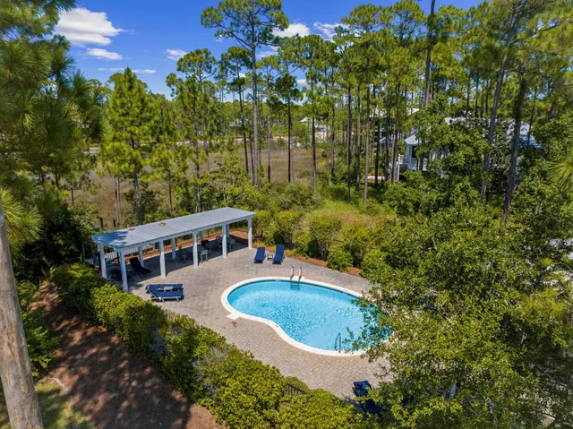a view of a water with a building in the background