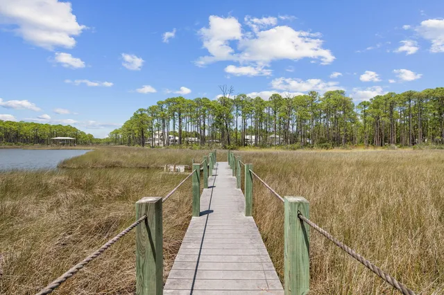 a view of a swimming pool with an outdoor space and seating area