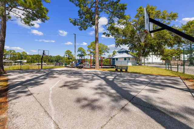 a view of a lake with a house in the background