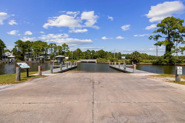 a view of swimming pool with outdoor seating