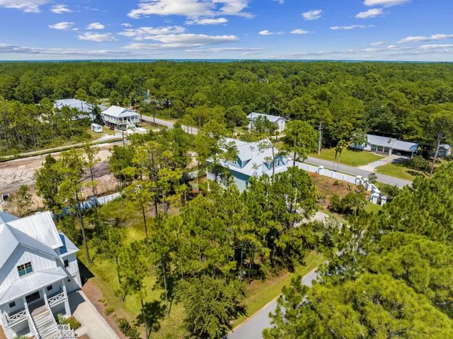 a view of a yard with swimming pool