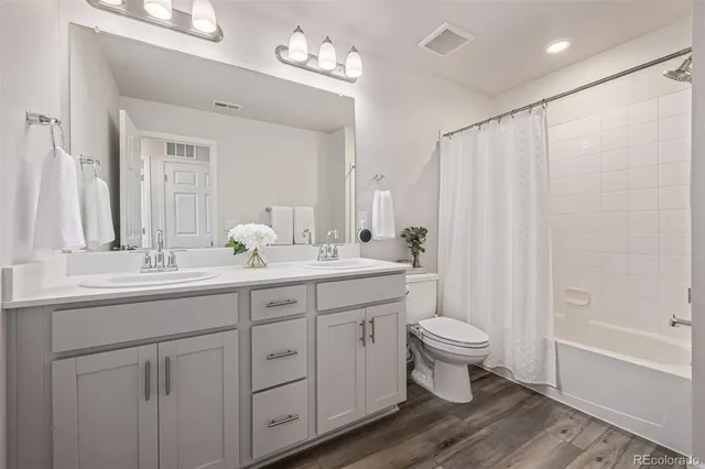 a view of a hallway with washer and dryer